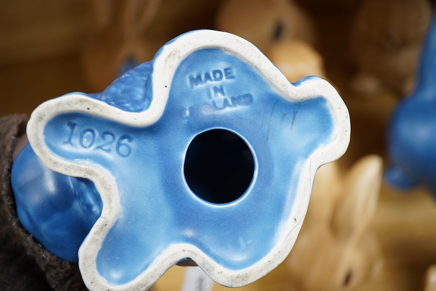 A collection of Sylvac bunny figures, one in the form of a teapot and a pair of dogs, largest 25cm high